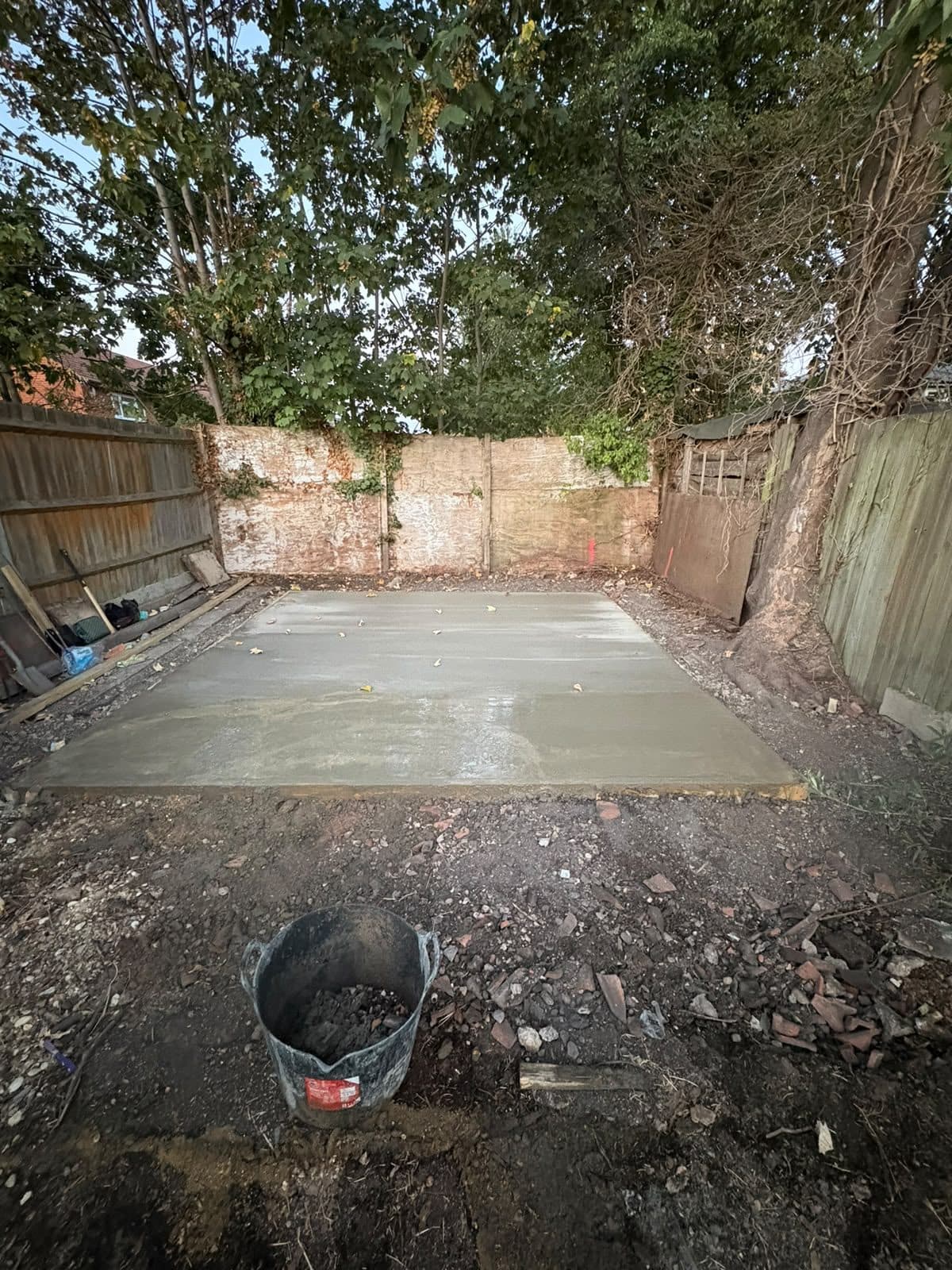 New concrete base laid in a back garden