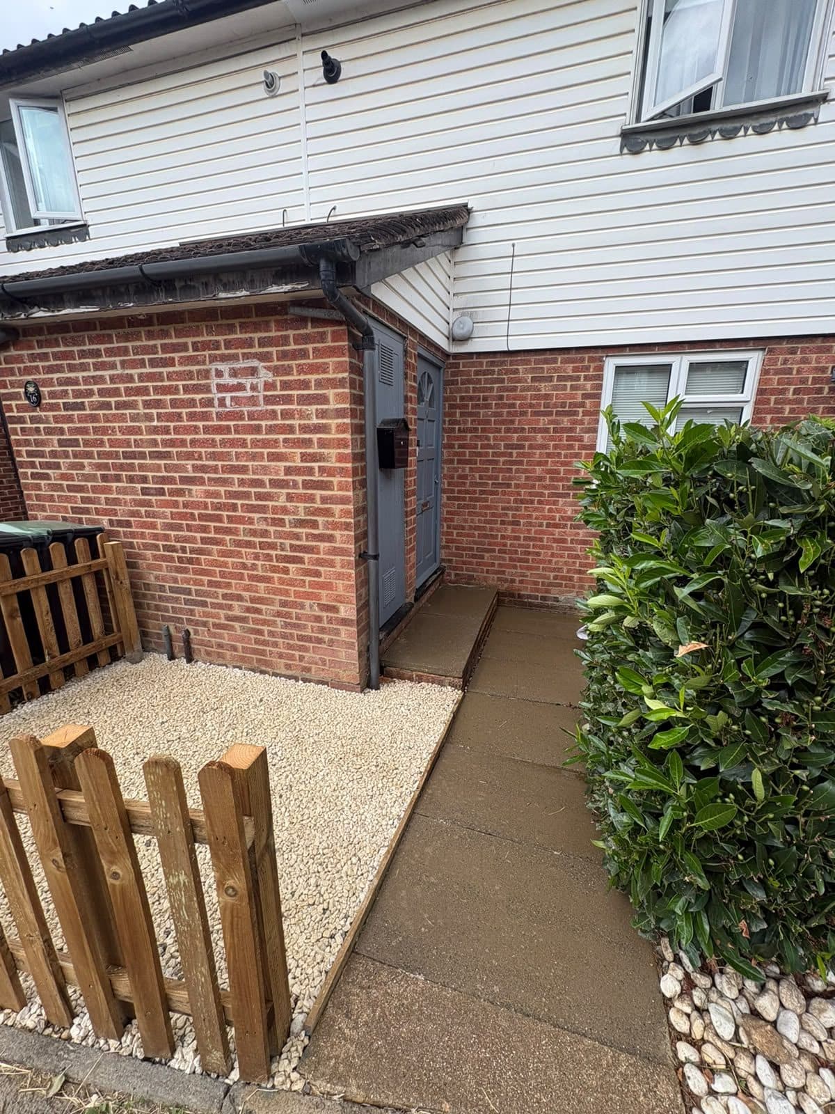 Front path and gravel garden with picket fencing