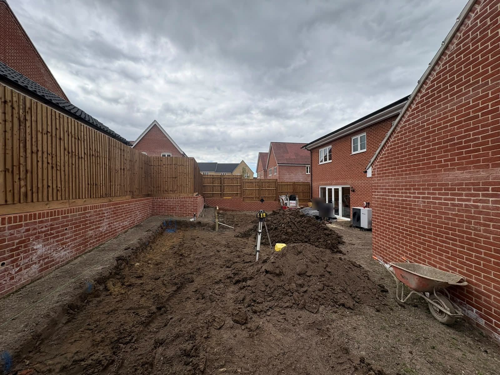 Brick retaining walls around a new-build garden, ready for landscaping