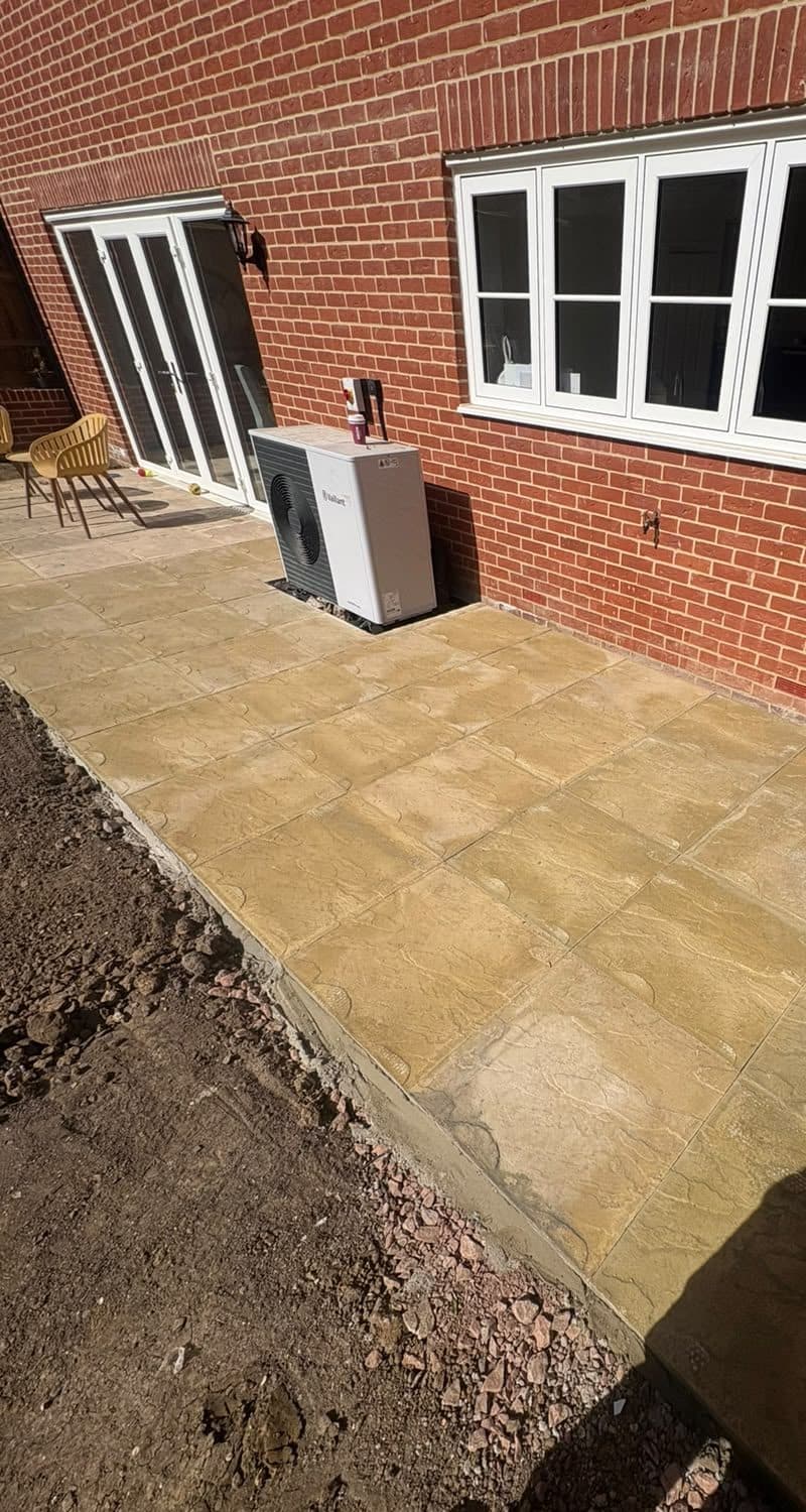 The same area with a new stone-effect patio laid