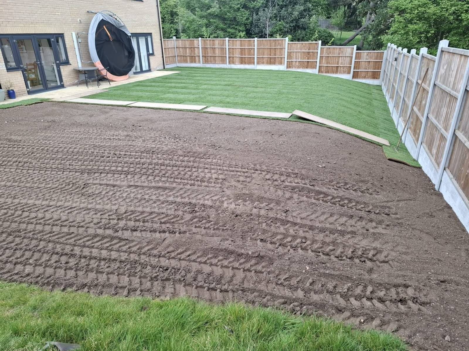 Large garden part-way through re-turfing